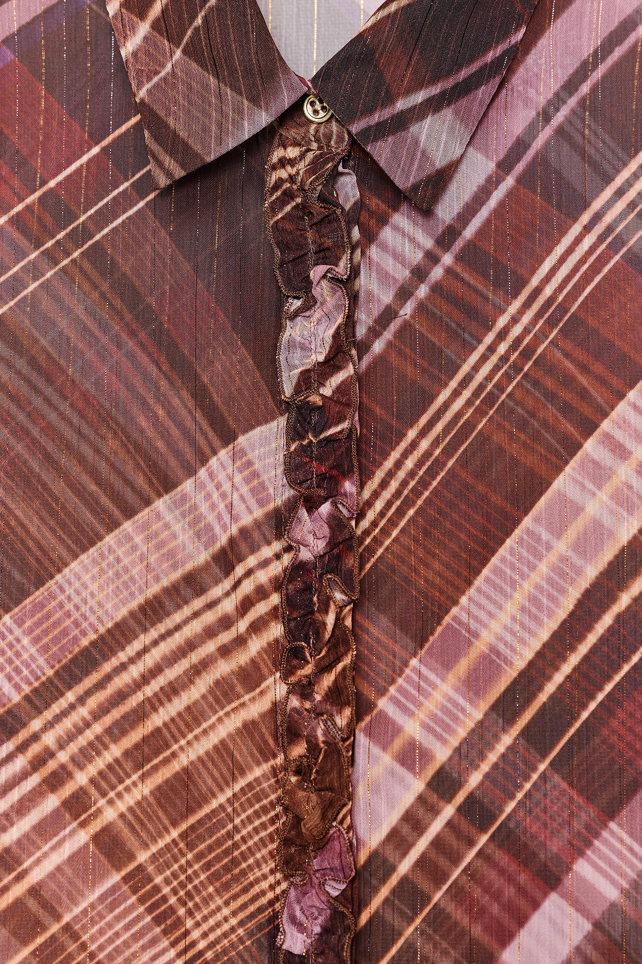 BLOUSE SEMI-TRANSPARENTE À CARREAUX